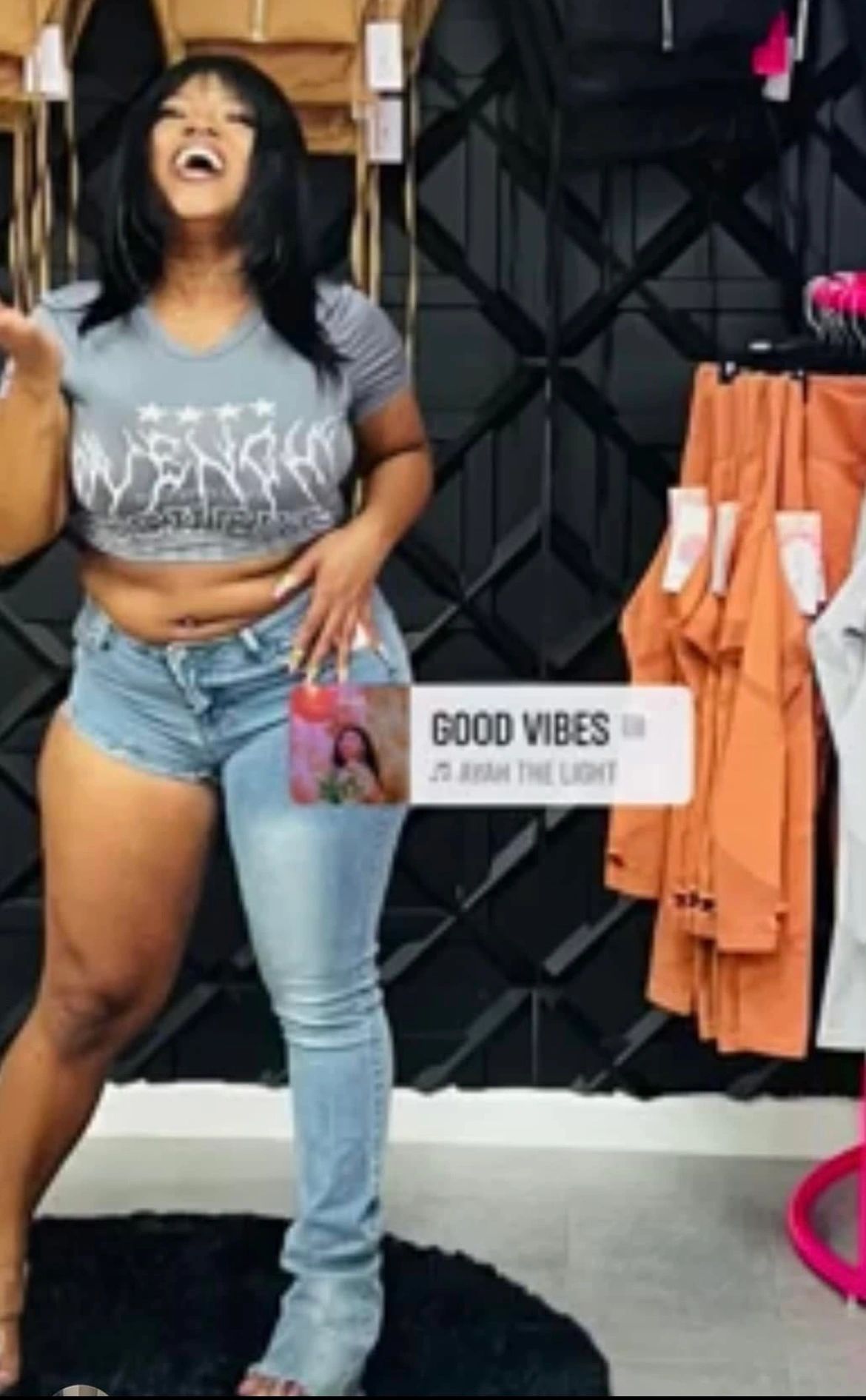 Woman in casual crop top and jeans